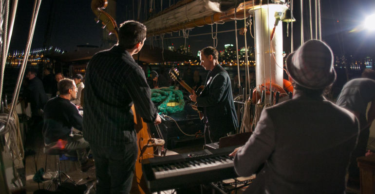 Wine and Jazz Sunset Sail Onboard the Clipper City Ship