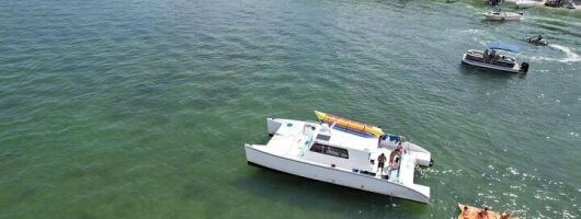 Aquatic Adventure: Boat Tour with Jetskis, Tubing, and Open Bar