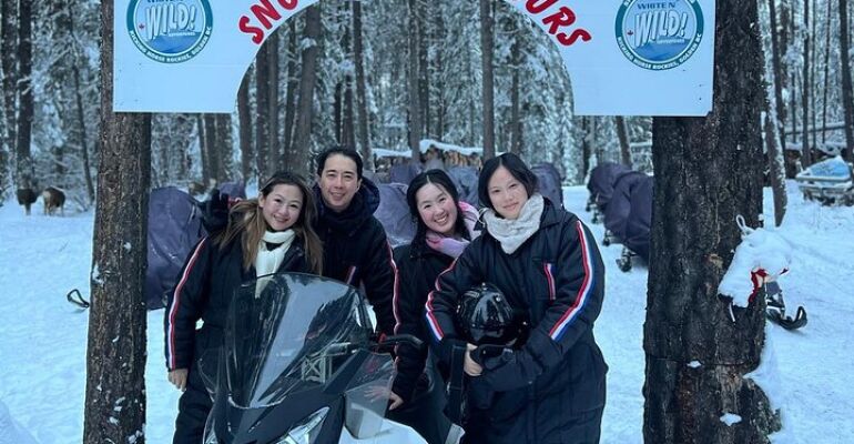 Golden Snowmobile Adventure in Winter Wonderland