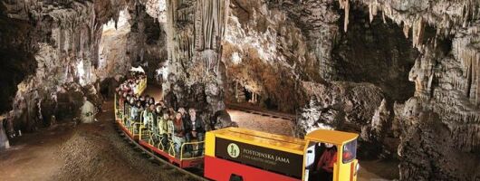 Postojna Cave and Predjama Castle from Sistiana