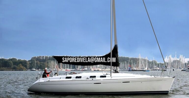 Alghero Coastal Sailing Tour and Lunch