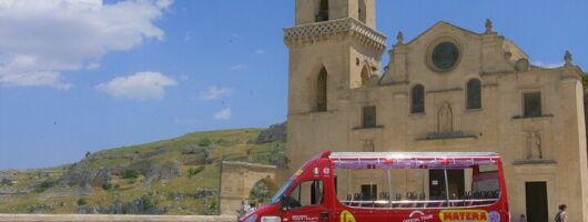 Panoramic Tour of the Sassi of Matera in Open-Bus with House-Cave 