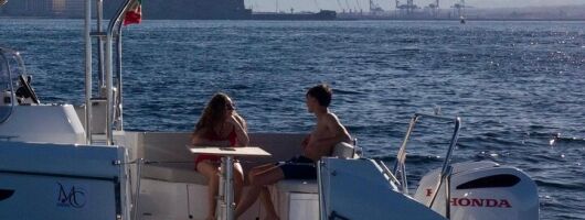 Sunset aperitif in the Gulf of Naples on Beneteau Flyer 9